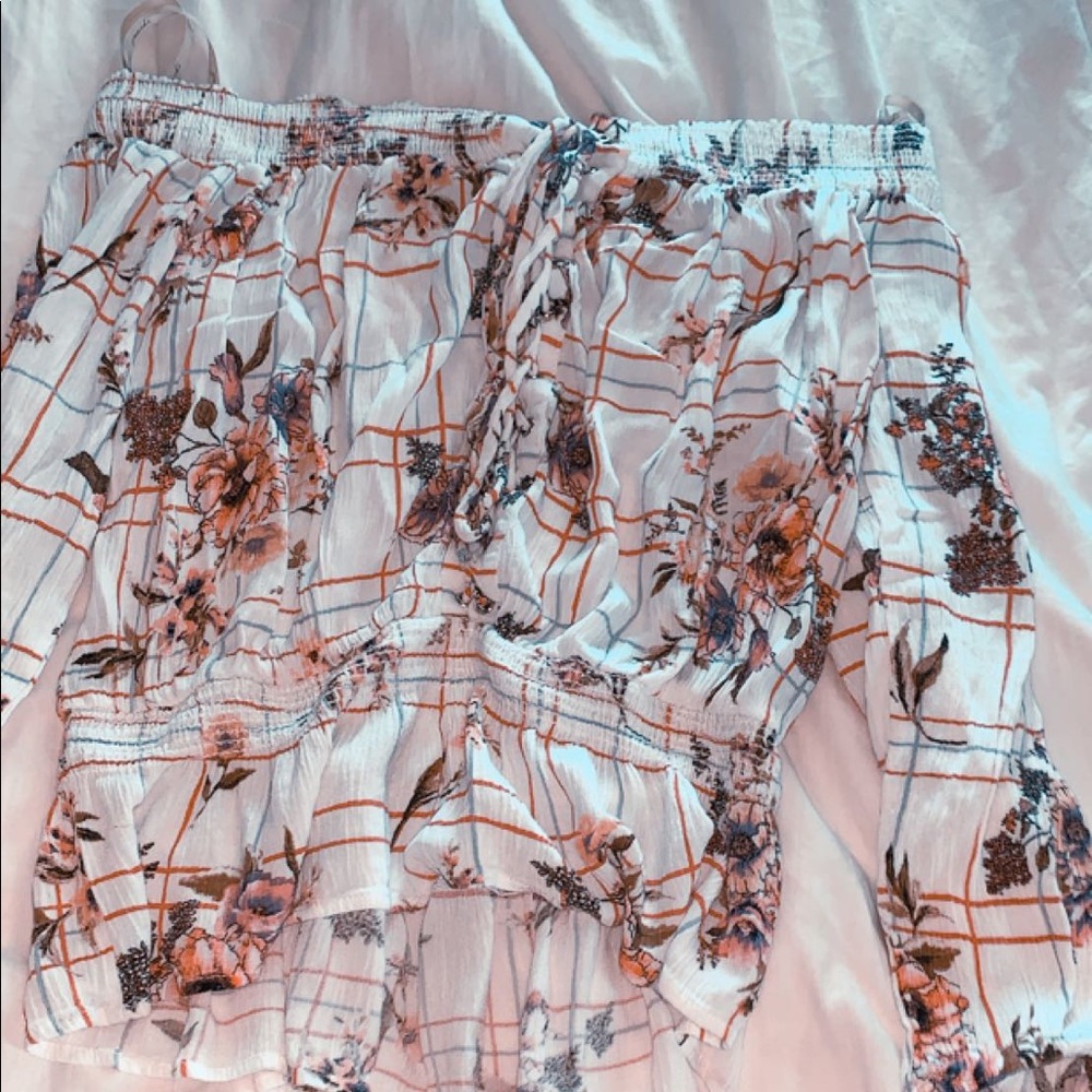 a floral off the shoulder gimmicks top